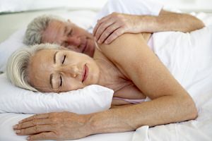 Elderly couple sleeping