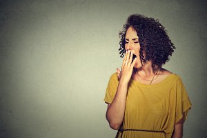 Woman yawning